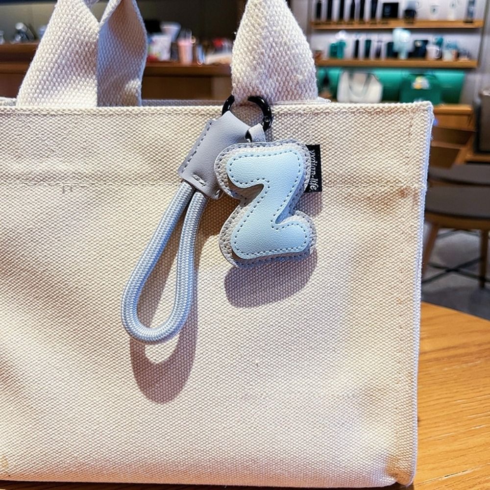 Sweet 26 Letter Keychain PU Le - đánh giá và giá Monogram Keychain Leather